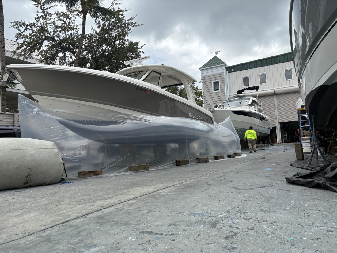 Luxury motor yacht hull serviced in a Naples boatyard