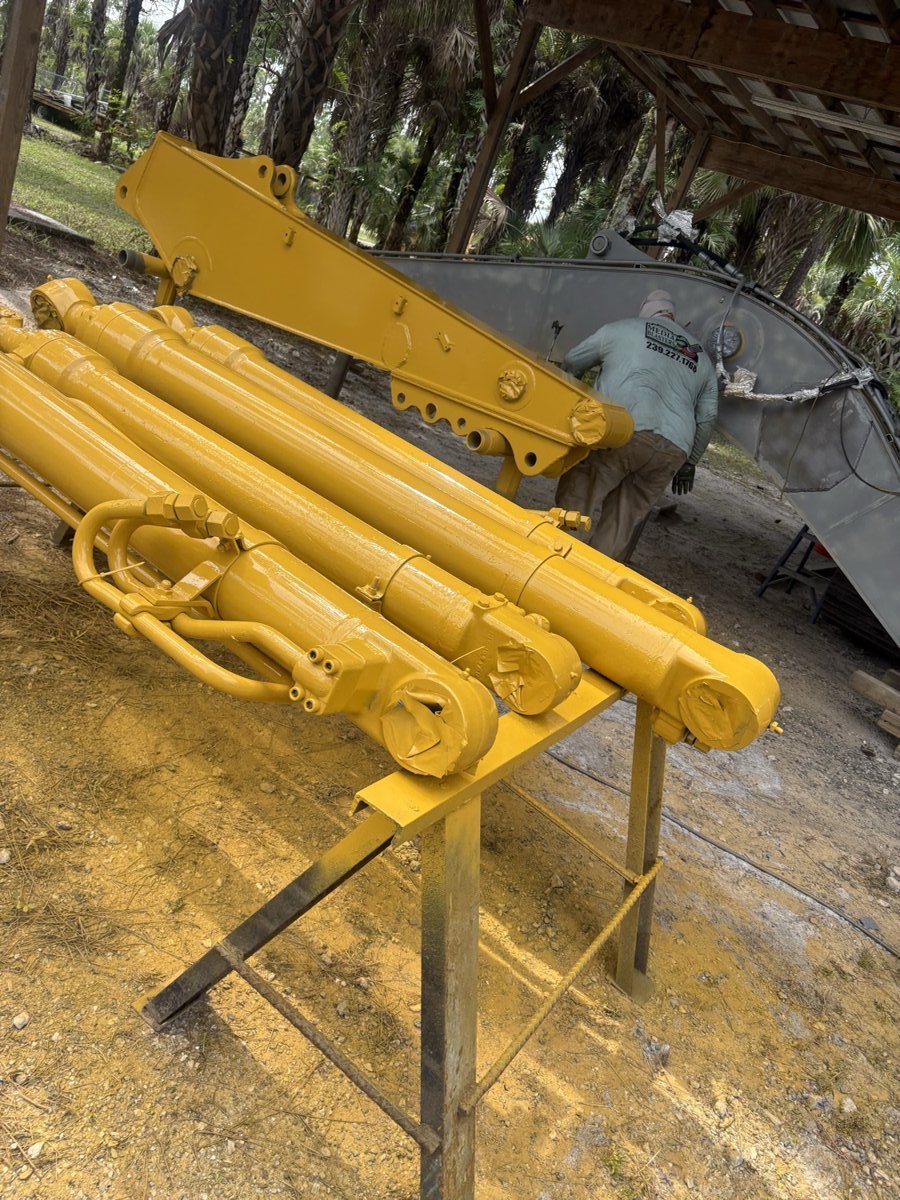Excavator hydraulic boom restored and refinished